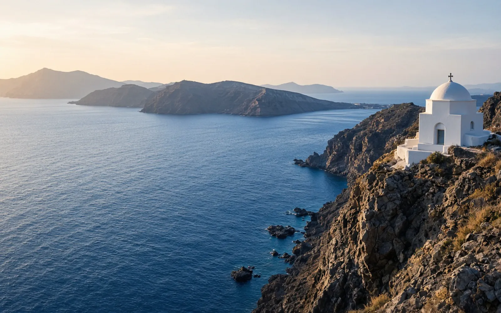 A white chapel above the Aegean Sea, Greece