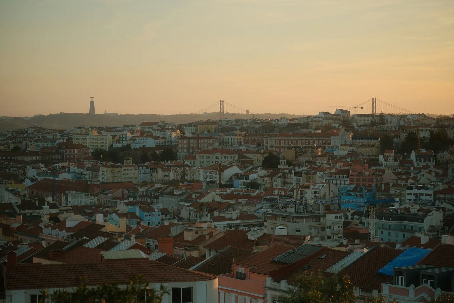 Lisbon rooftops and the Tagus at dusk, Portugal